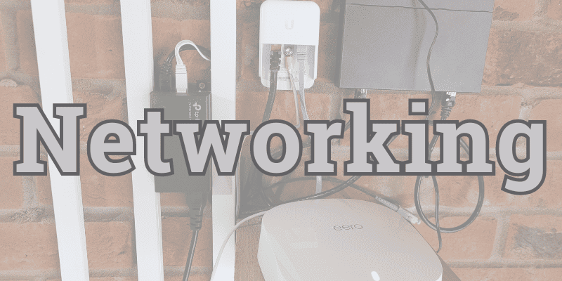 Various networking equipment in the background with the text Networking
